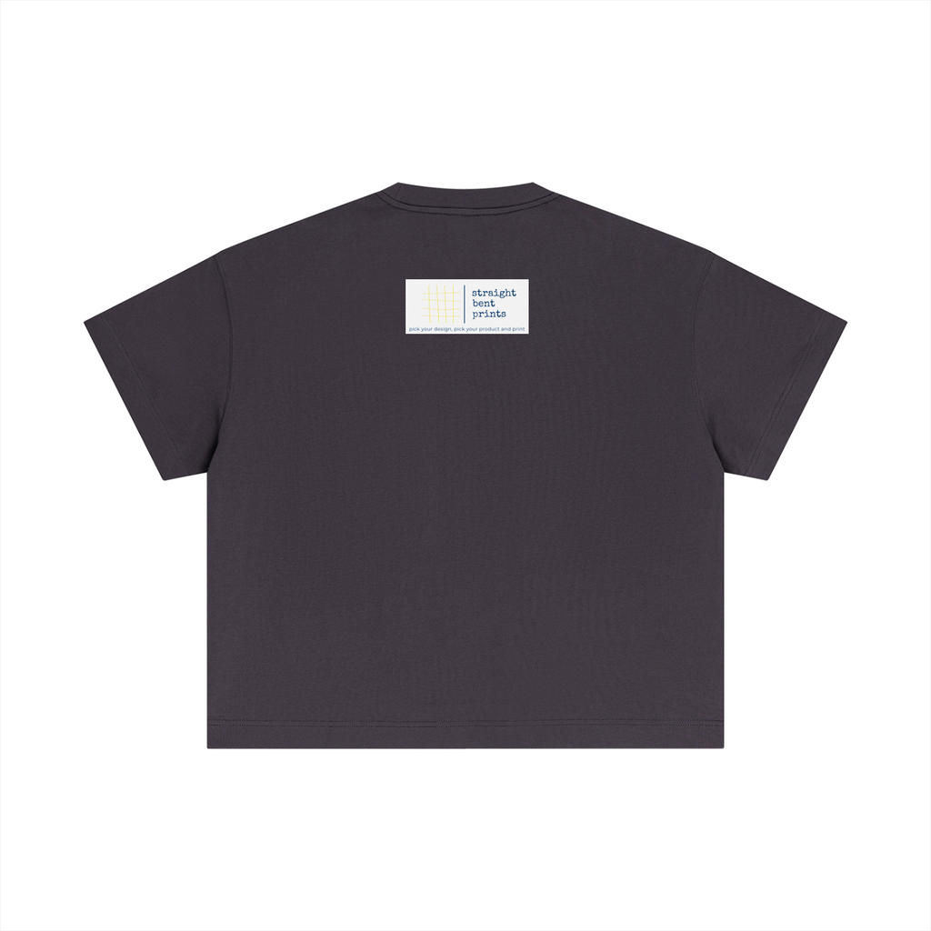 Black t-shirt with a small white label on the back against a white background