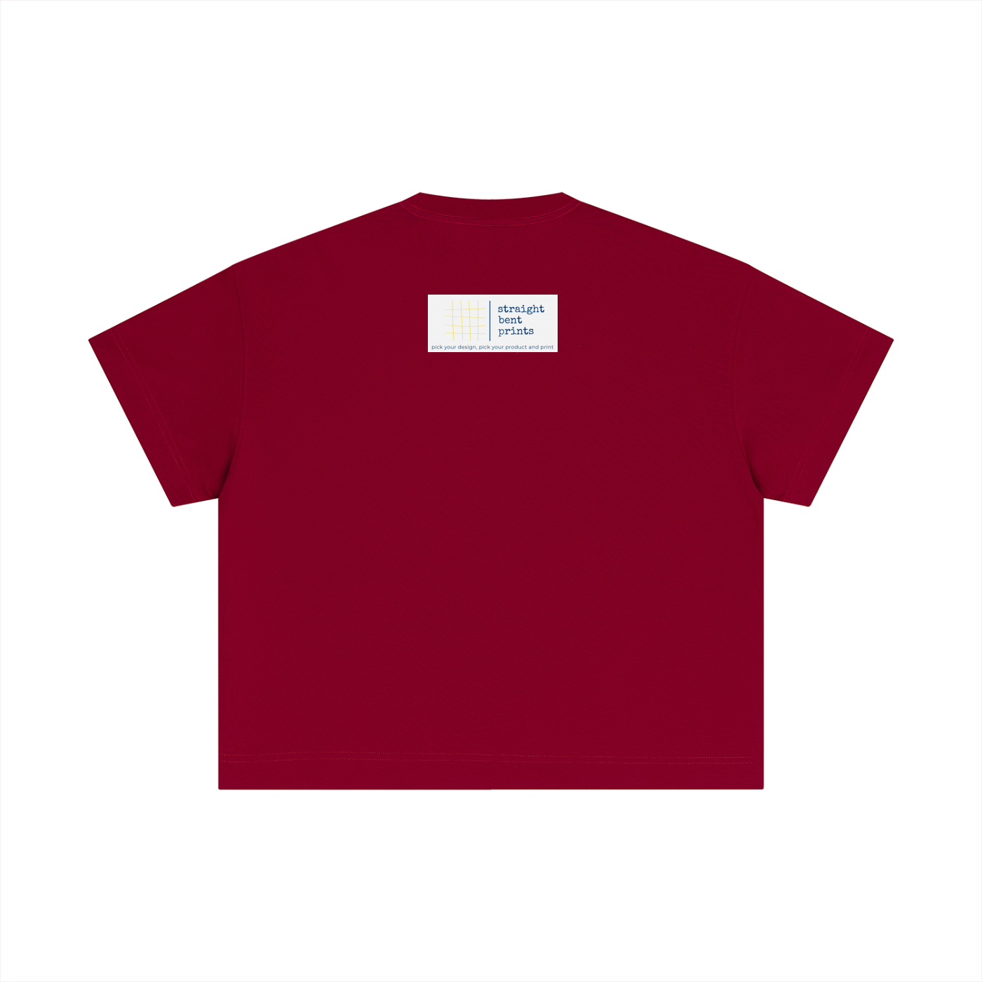 Maroon t-shirt with a small white label on a white background