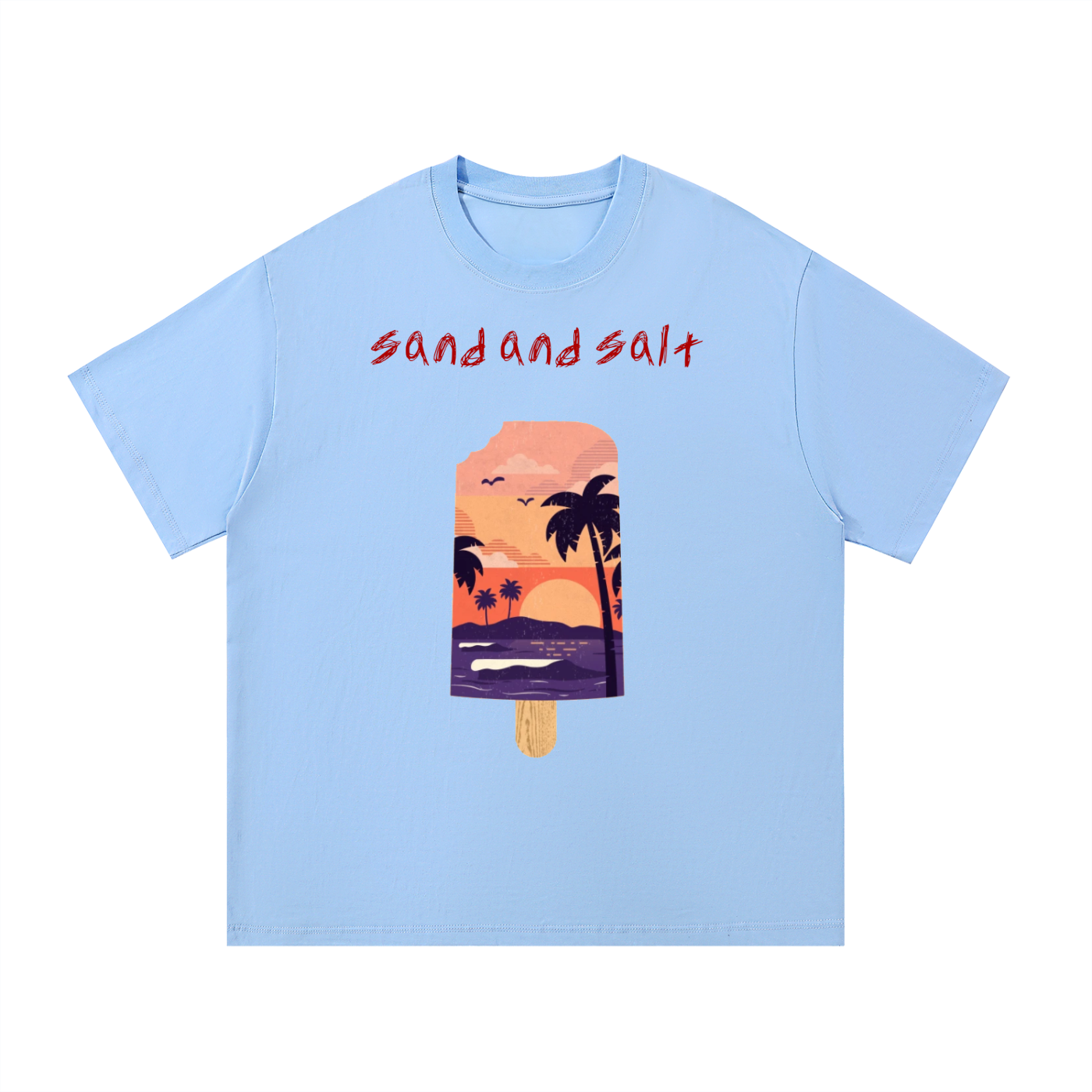 Light blue t-shirt with a tropical-themed graphic and 'sand and salt' text on a white background