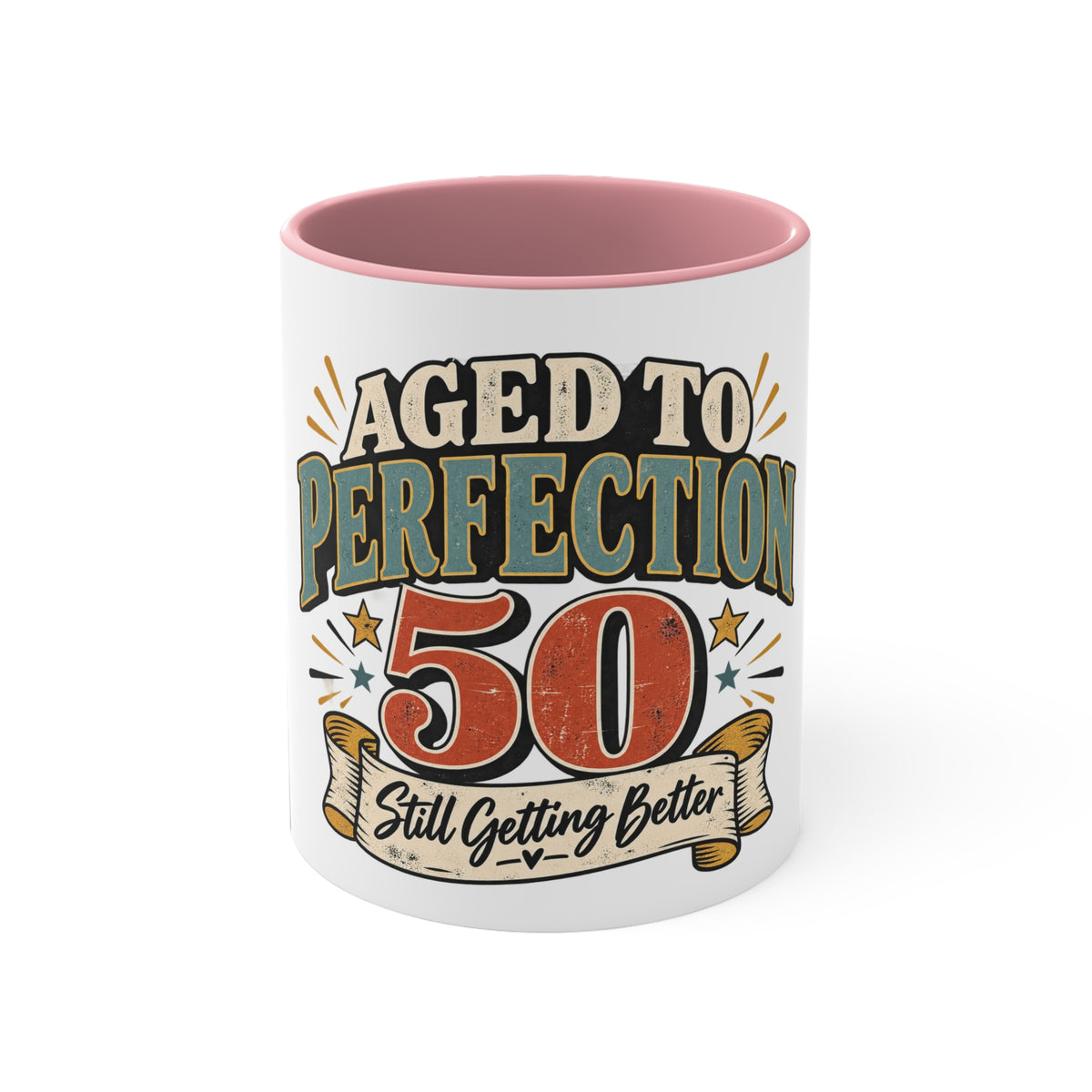 A white ceramic mug with a pink interior, featuring a retro-style graphic that reads 'AGED TO PERFECTION 50 Still Getting Better' in beige, teal, and orange lettering.