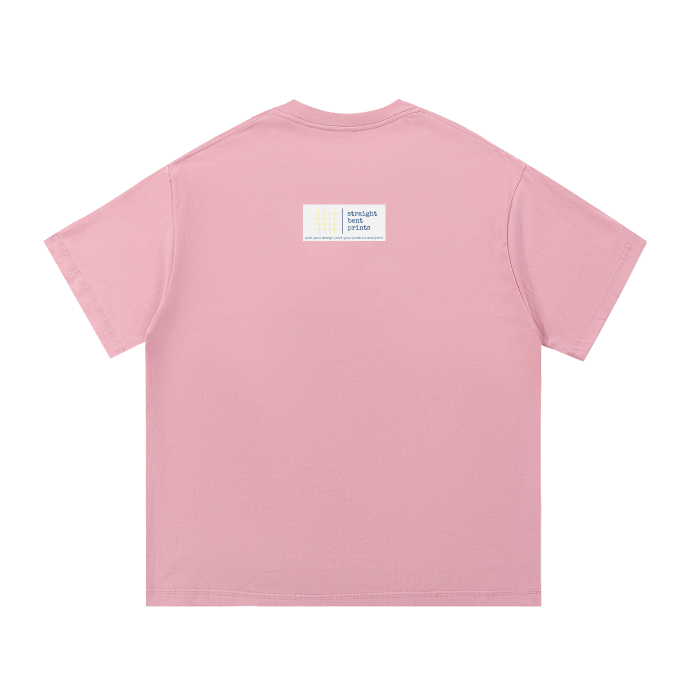 Pink t-shirt with a small label on the back against a white background