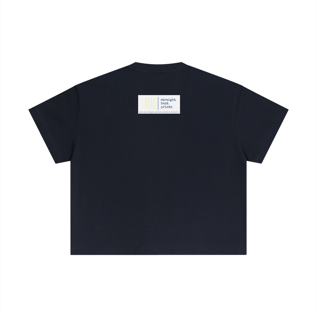 Black t-shirt with a small white label on the chest against a white background