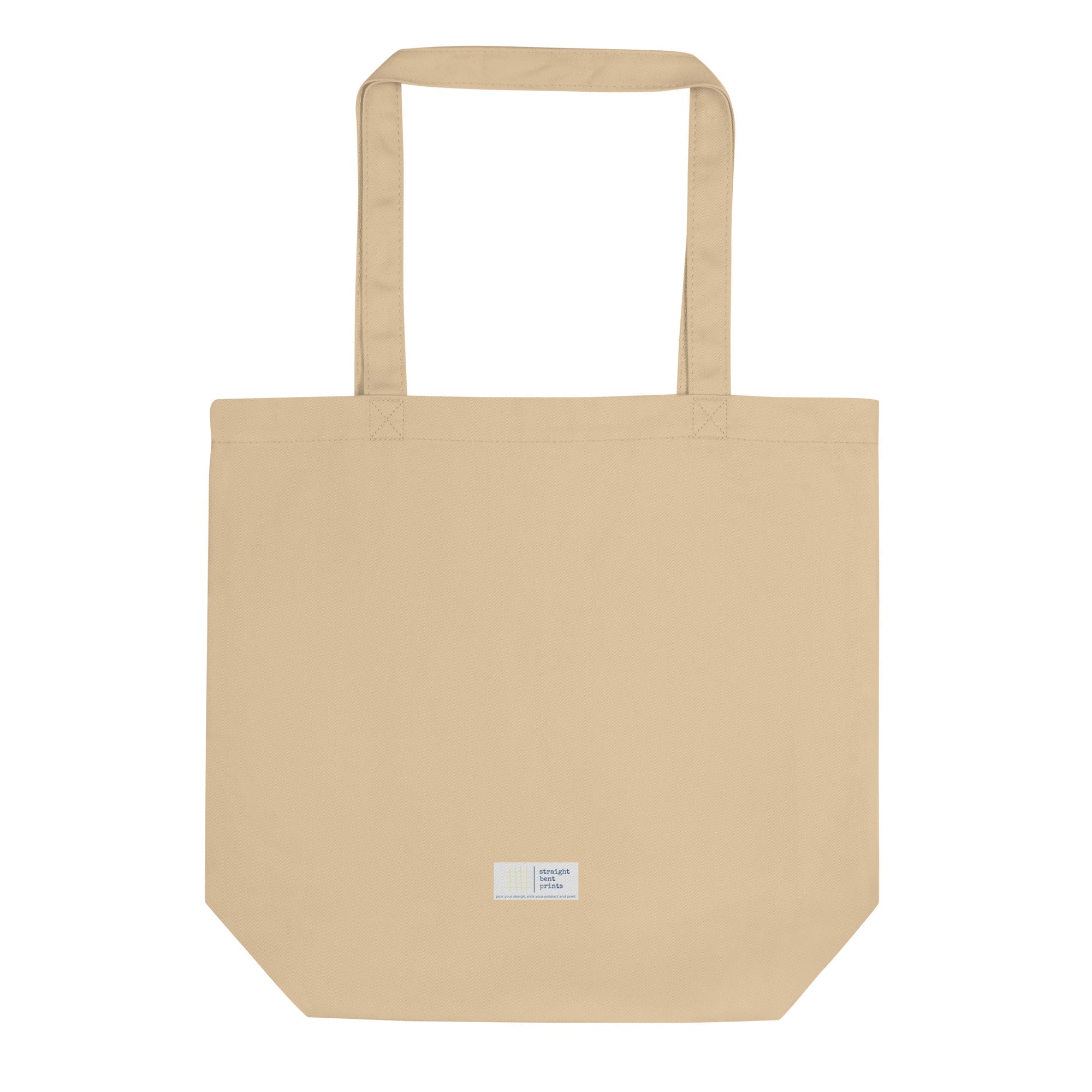 Beige tote bag with a small label on a white background
