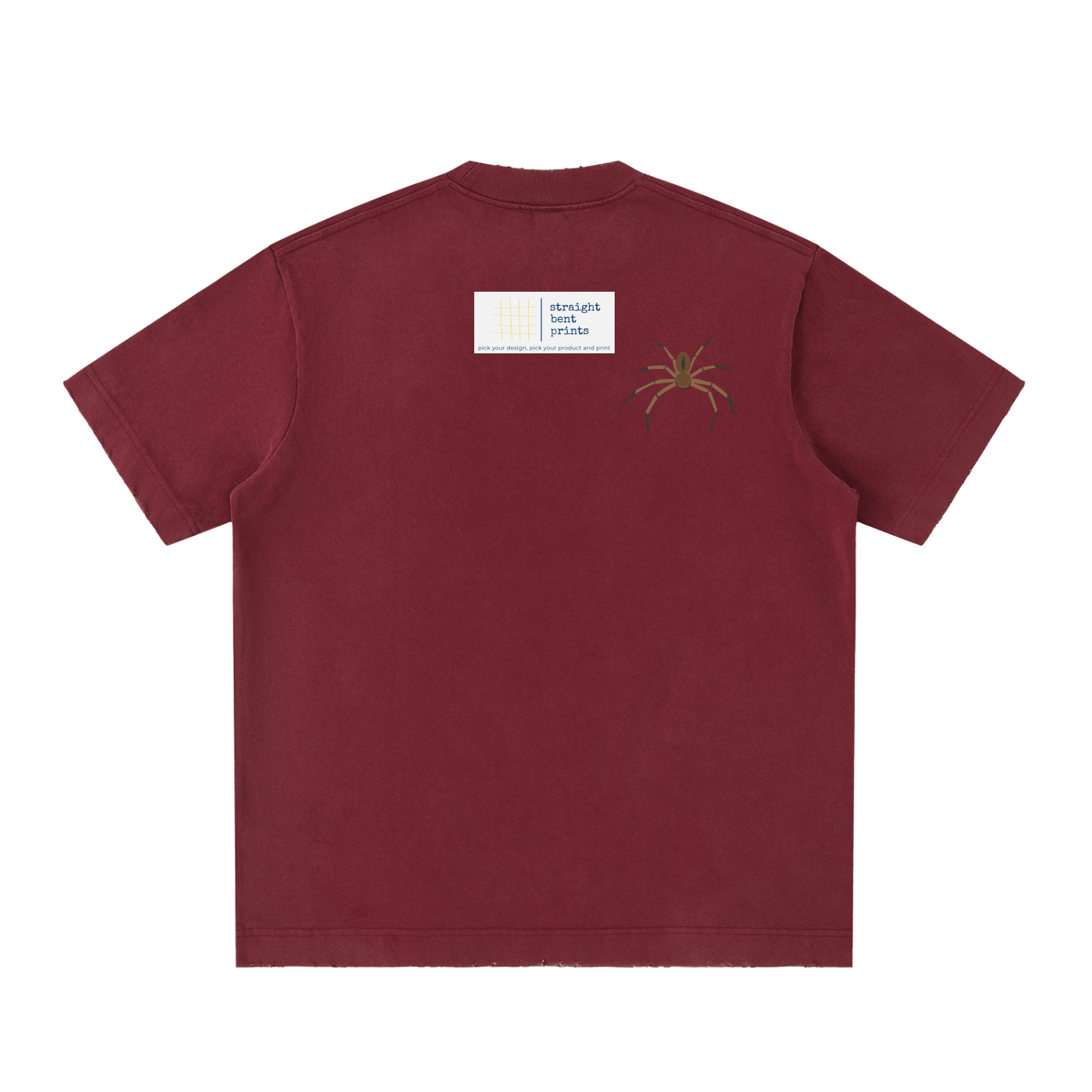 Maroon t-shirt with a small white label and green design on the back against a white background