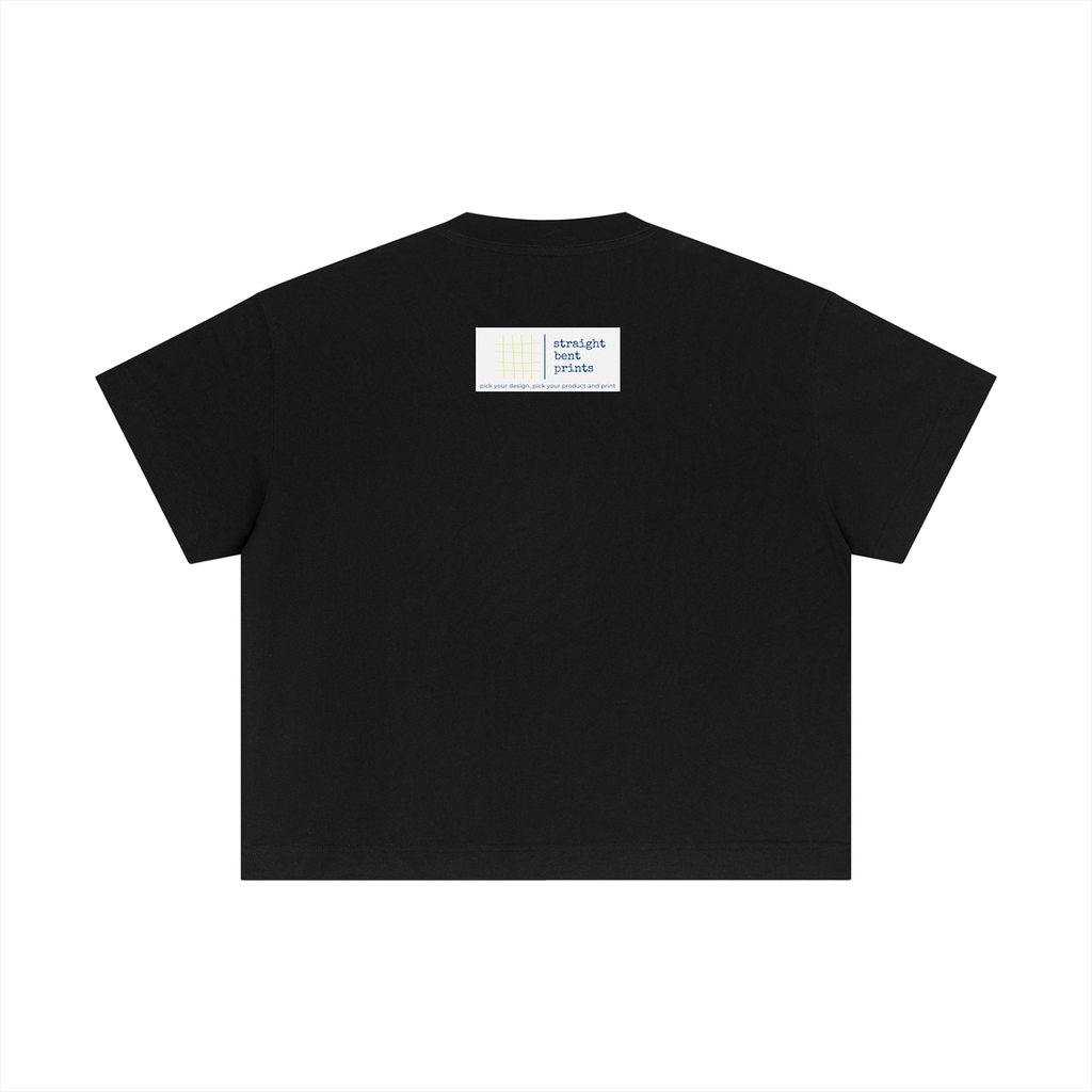 Black t-shirt with a small white label on the chest against a white background