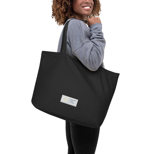 person holding bag show rear white back ground
