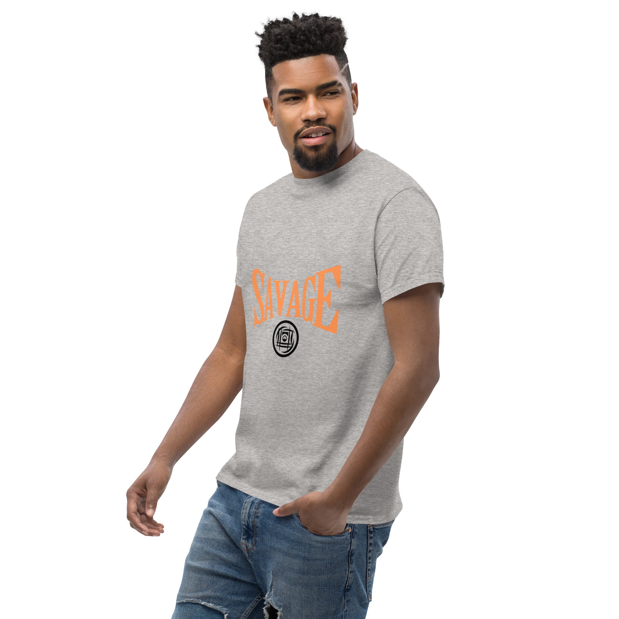 Man wearing a gray t-shirt with 'SAVAGE' printed in orange on a white background