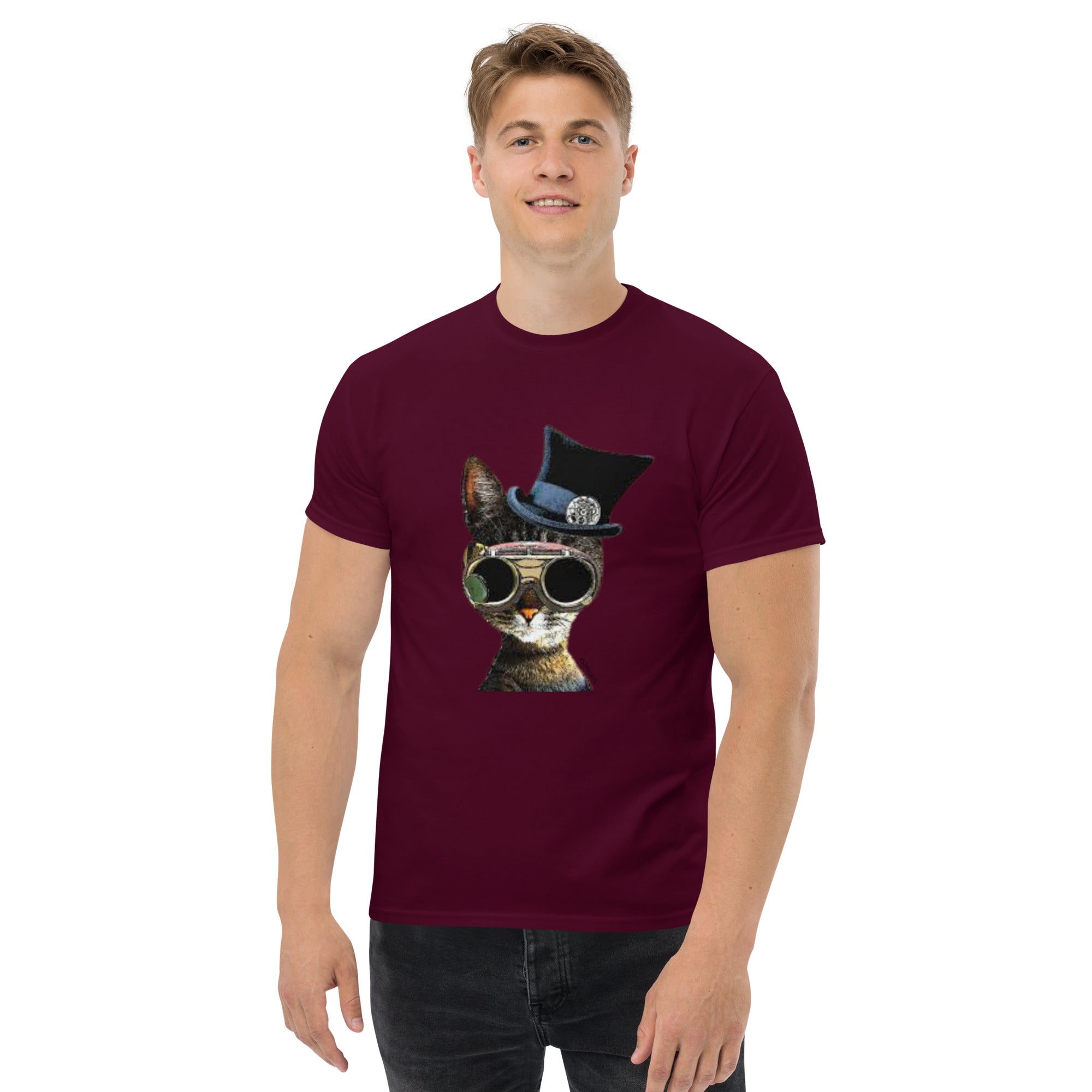 Man wearing a maroon t-shirt with a cat graphic design on a white background