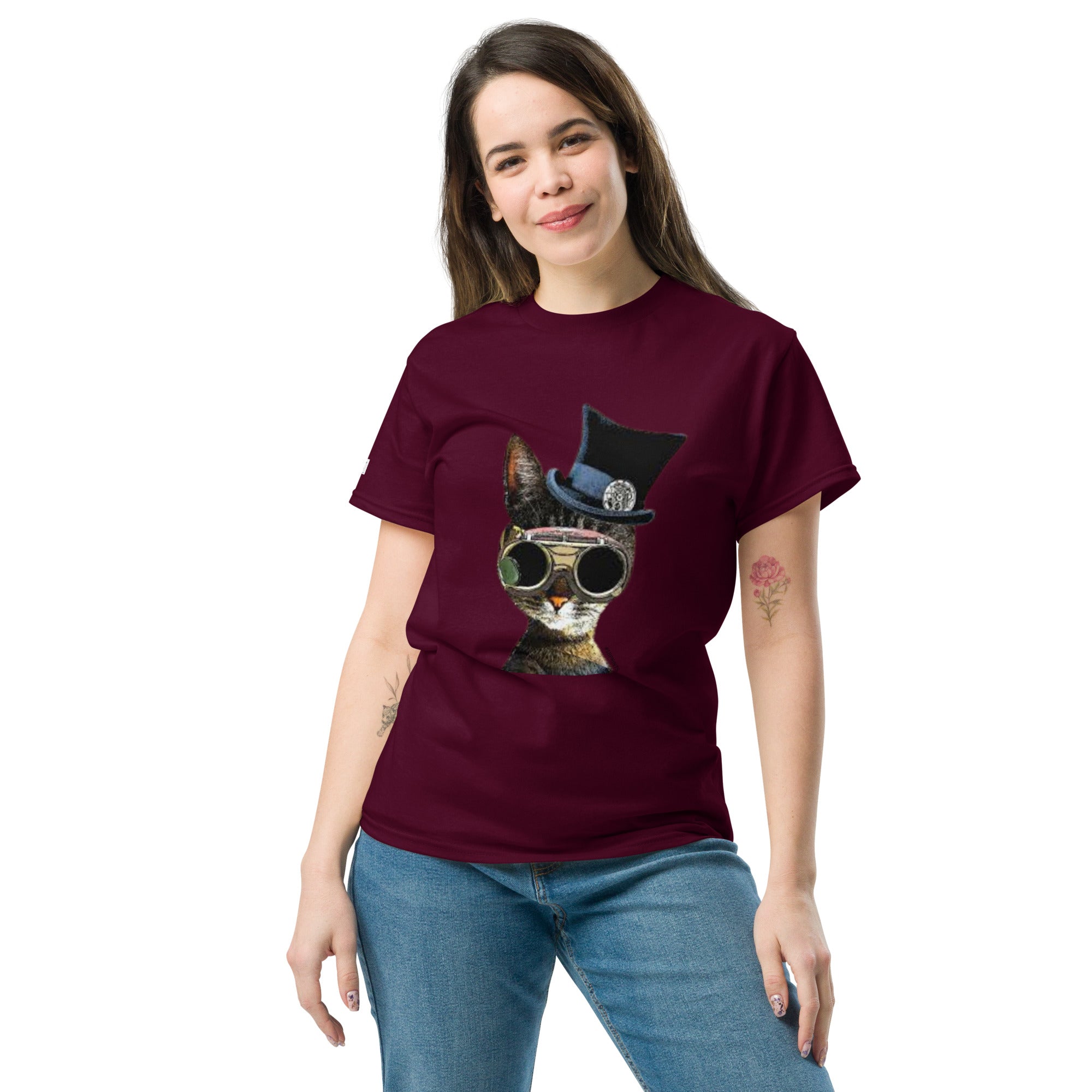 Woman wearing a maroon t-shirt with a cat graphic design on a white background