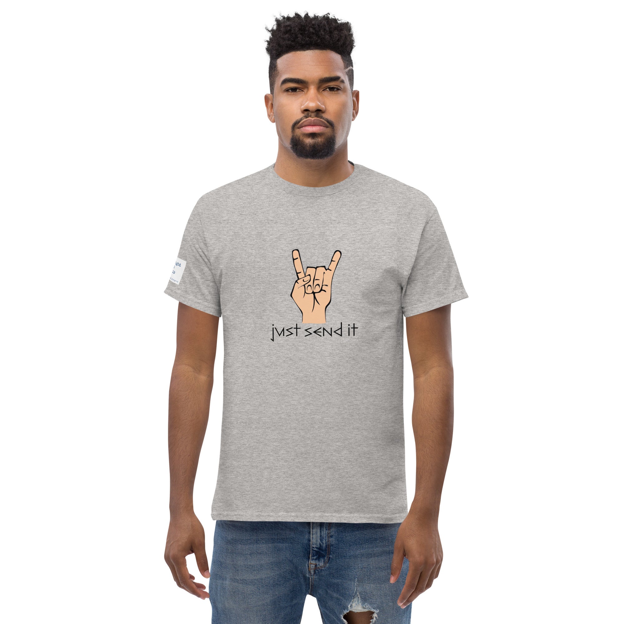 Man wearing a gray t-shirt with a graphic and text on a white background