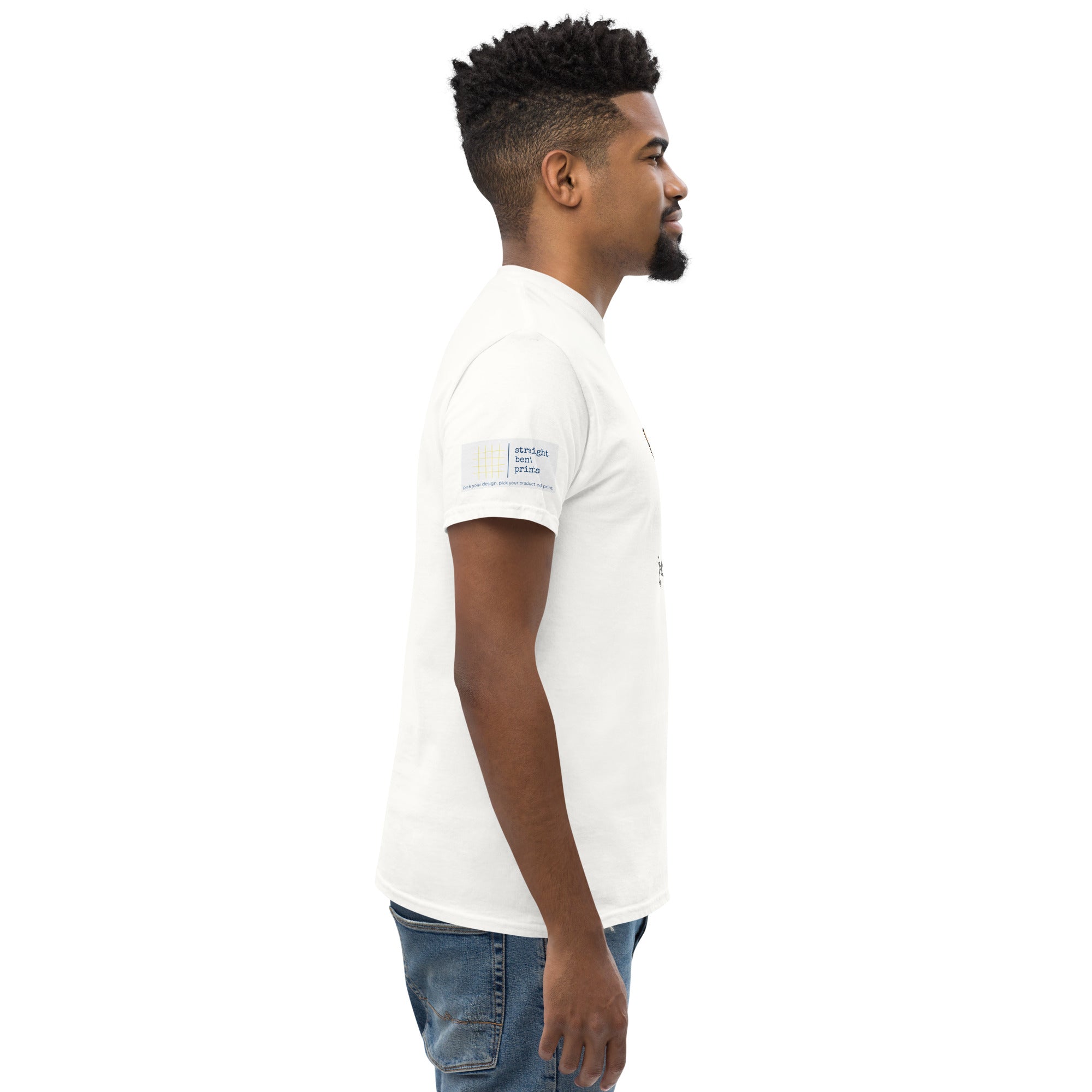 Man wearing a white t-shirt with a logo on the sleeve against a white background