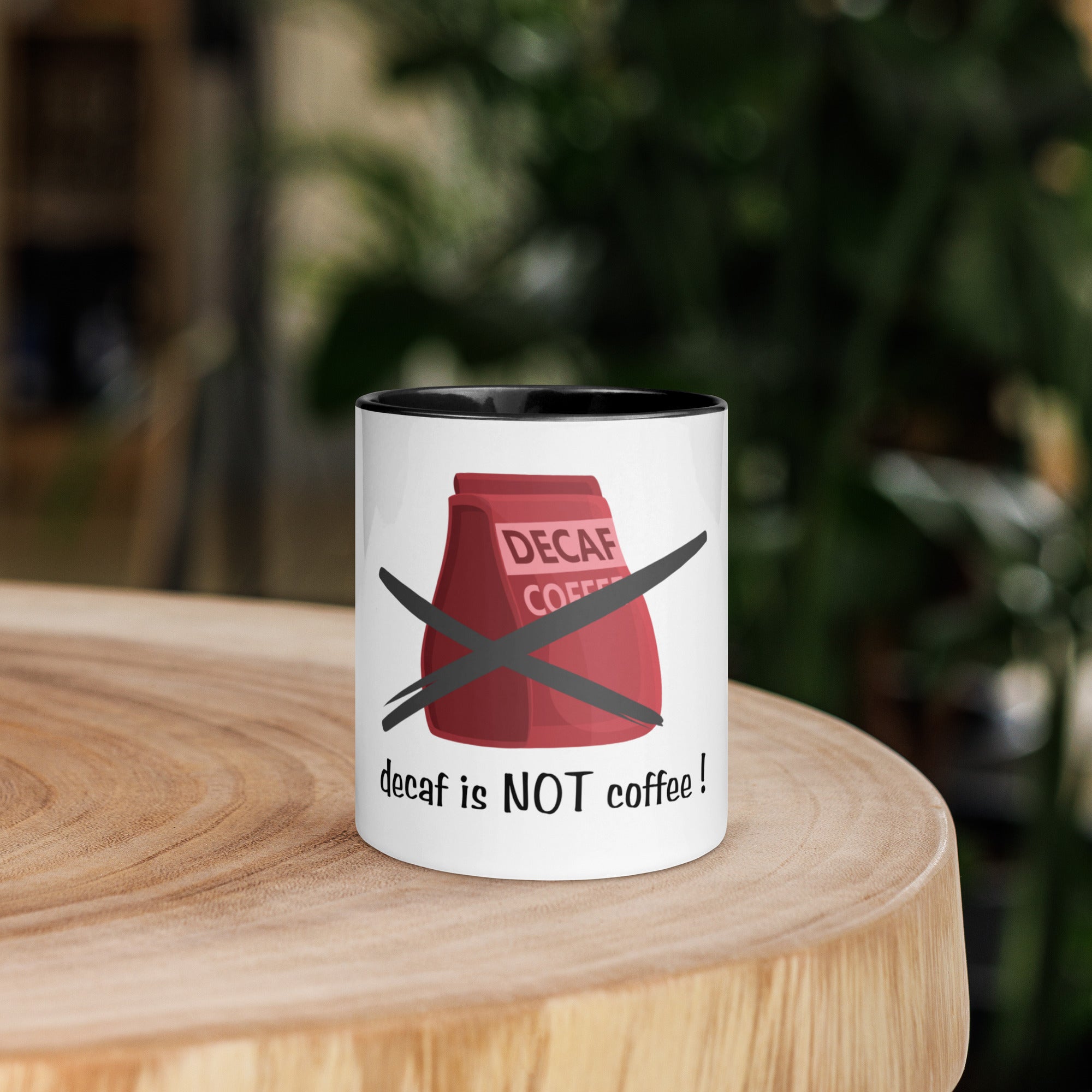 Mug with a decaf coffee design on a wooden surface