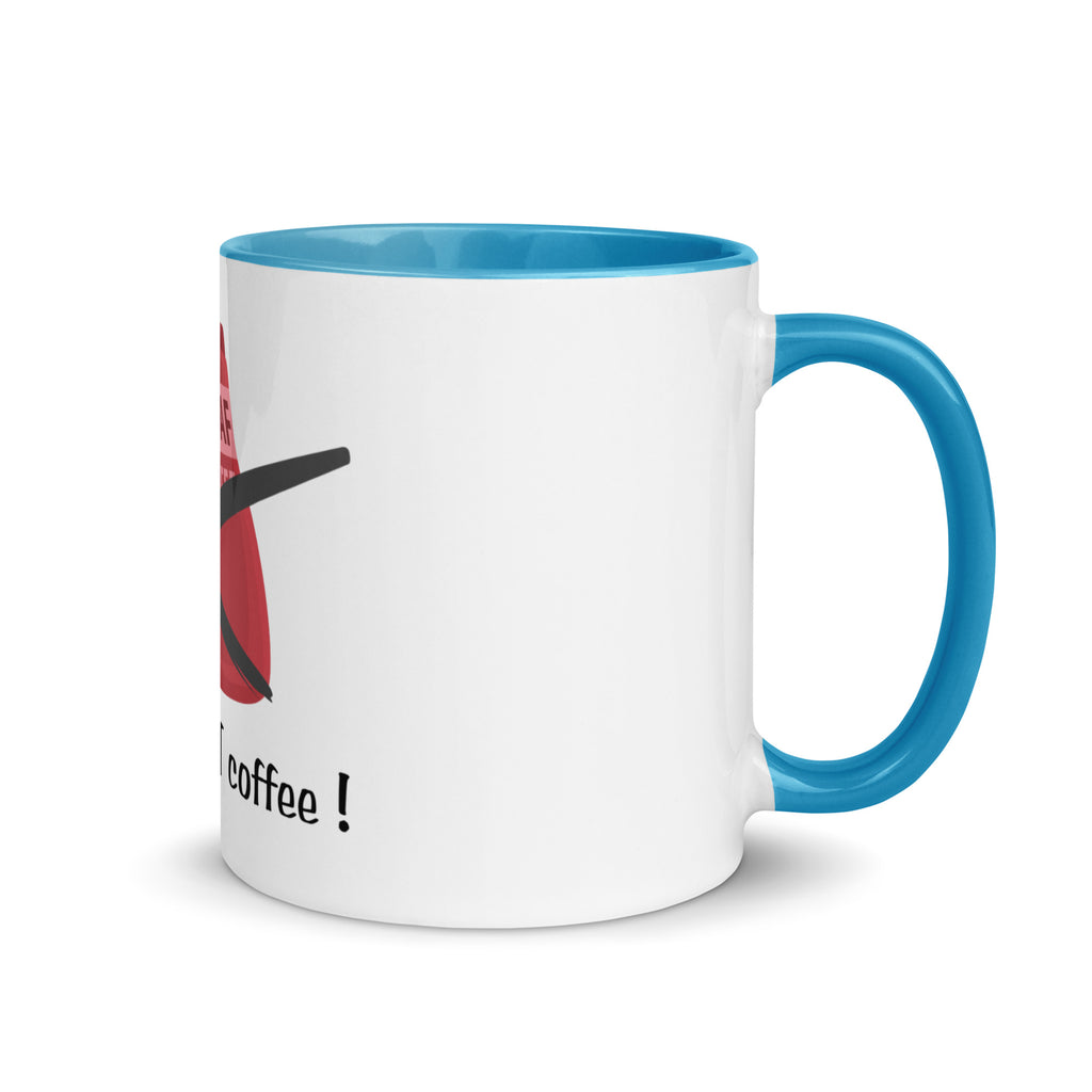White mug with blue handle and interior, featuring a red and black design and text on a white background.
