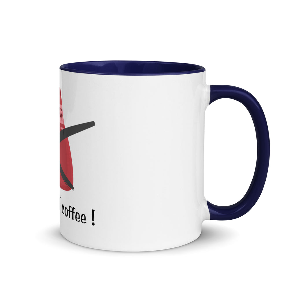White mug with navy handle and interior, featuring a design and text on a white background