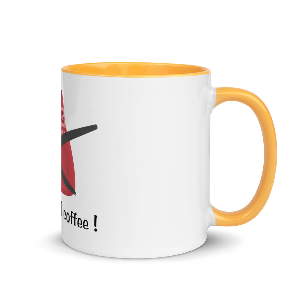 White mug with yellow handle and interior, featuring a red and black design and text on a white background.