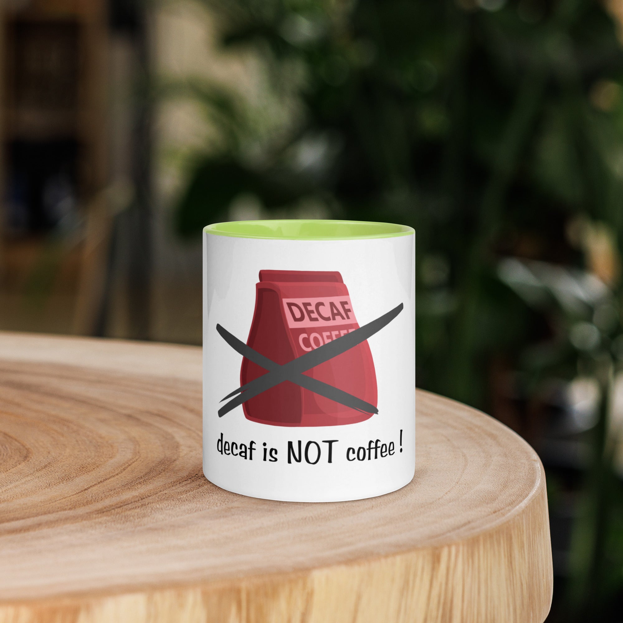 Mug with a decaf coffee design on a wooden surface