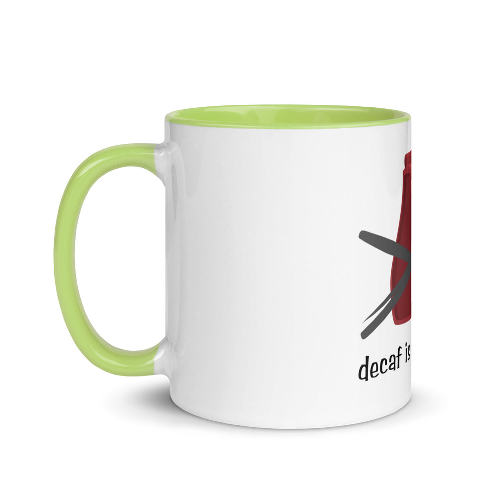 White mug with green handle and interior, featuring a graphic and text on a white background
