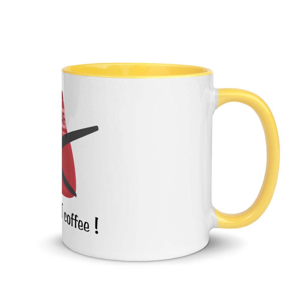 White mug with yellow handle and interior, featuring a red and black design and text on a white background.
