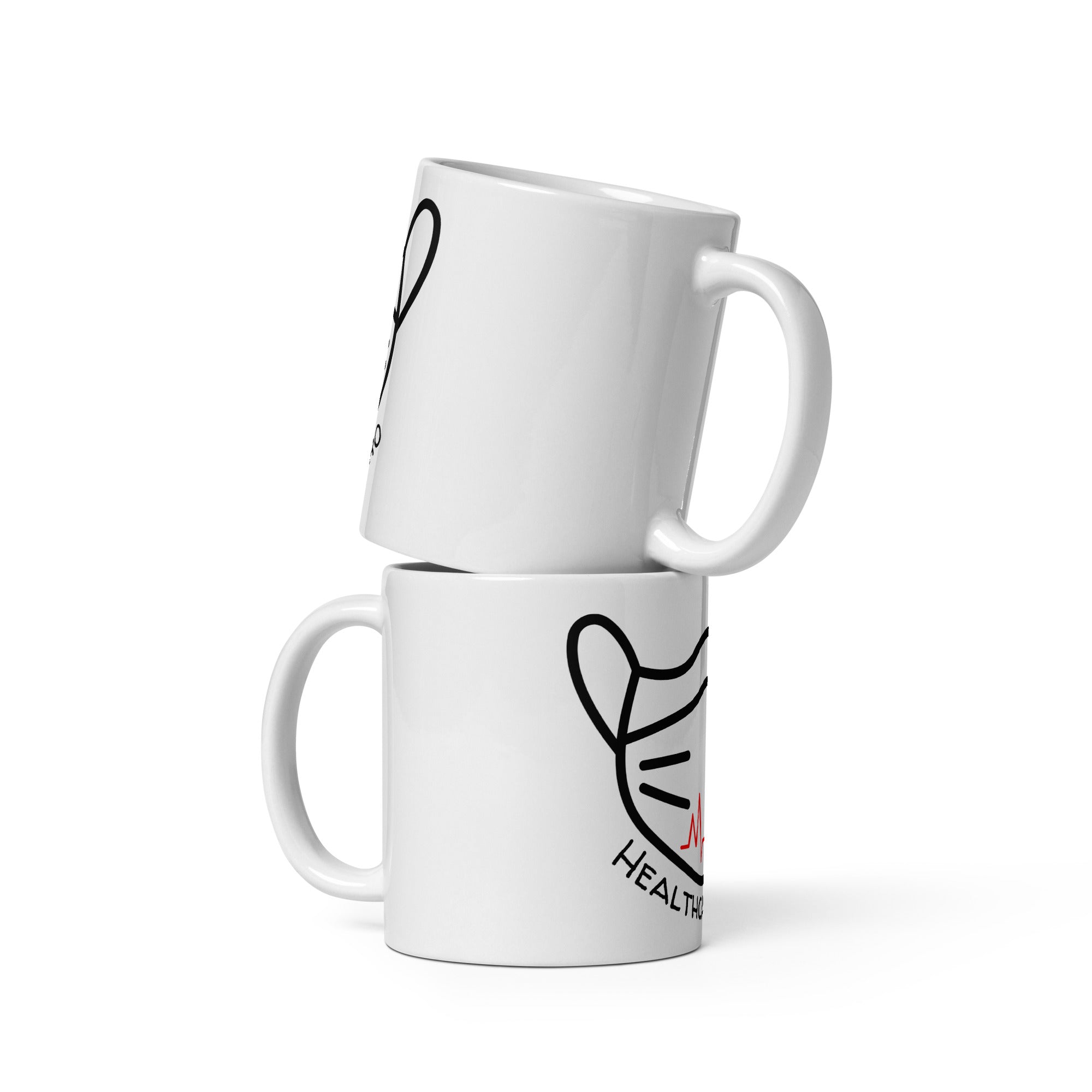 Two white mugs with black and red designs stacked on a white background