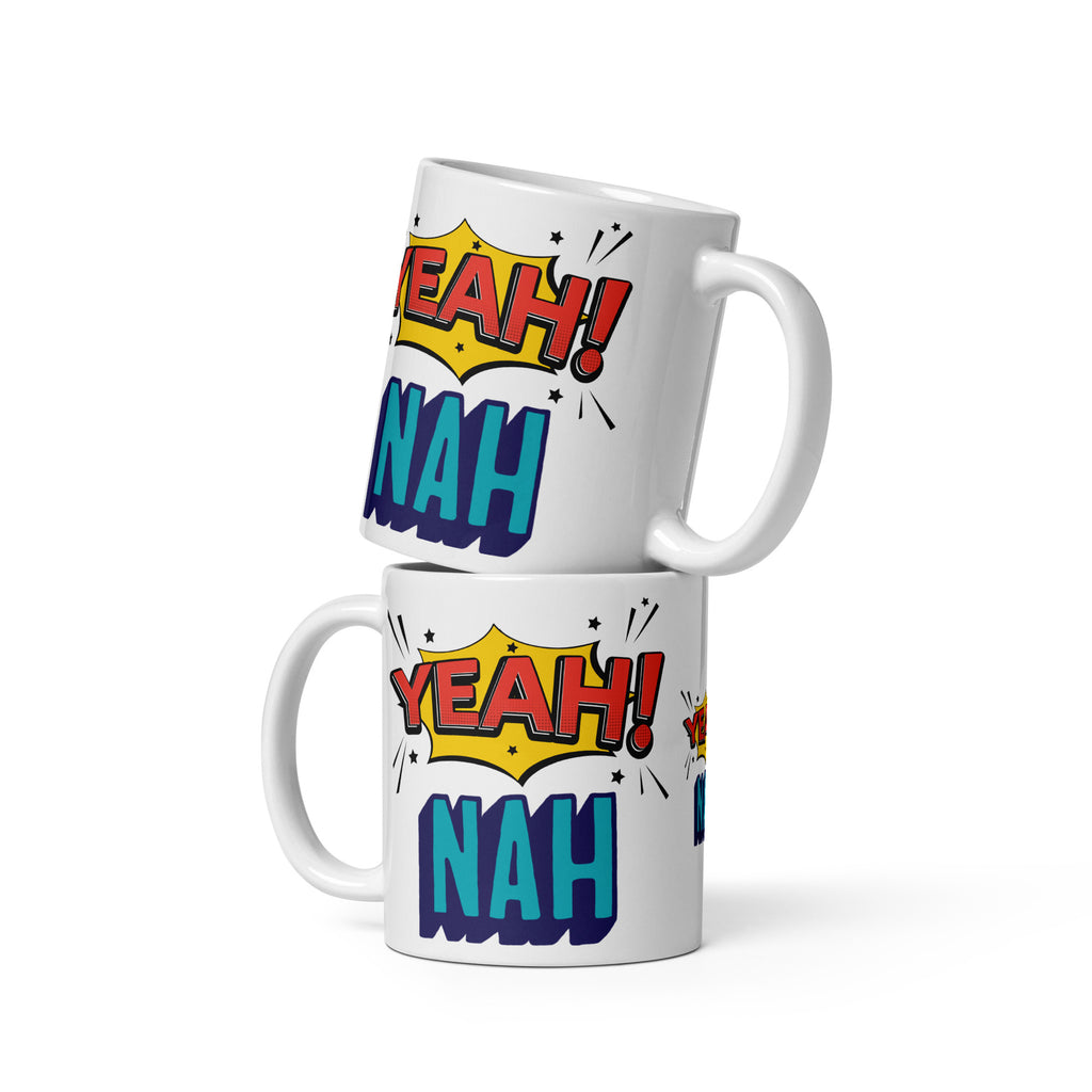 Two white mugs with colorful 'Yeah! Nah!' text design on a white background